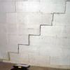 A diagonal stair step crack along the foundation wall of a Opelika home