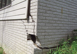 A severely damaged foundation wall in Madison