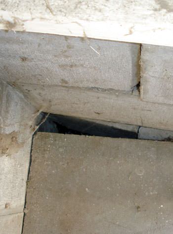 inward rotation of a foundation wall damaged by street creep in a garage in Selma