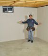 Dothan basement insulation covered by EverLast™ wall paneling, with SilverGlo™ insulation underneath