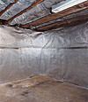An energy efficient radiant heat and vapor barrier for a Talladega basement finishing project