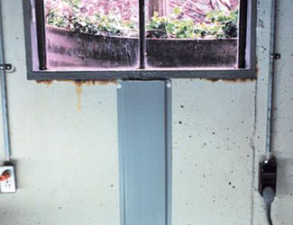 Repaired waterproofed basement window leak in Columbus